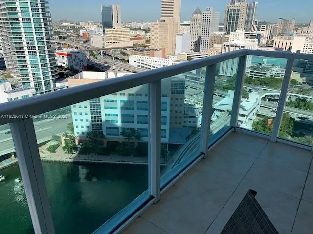 a view of swimming pool from a balcony