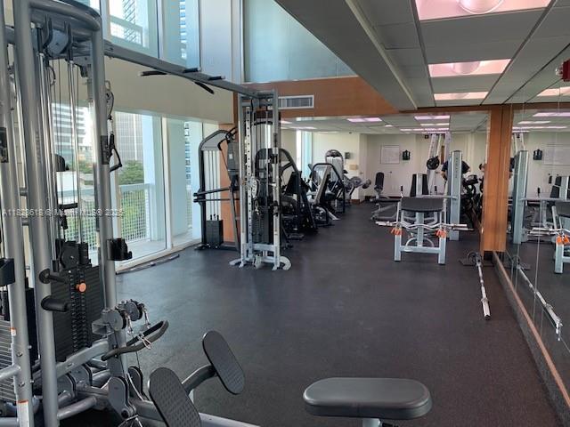 31 Southeast 5th Street, Unit 2601 Miami, FL 33131 - Photo 35 of 41 a view of a room with gym equipment