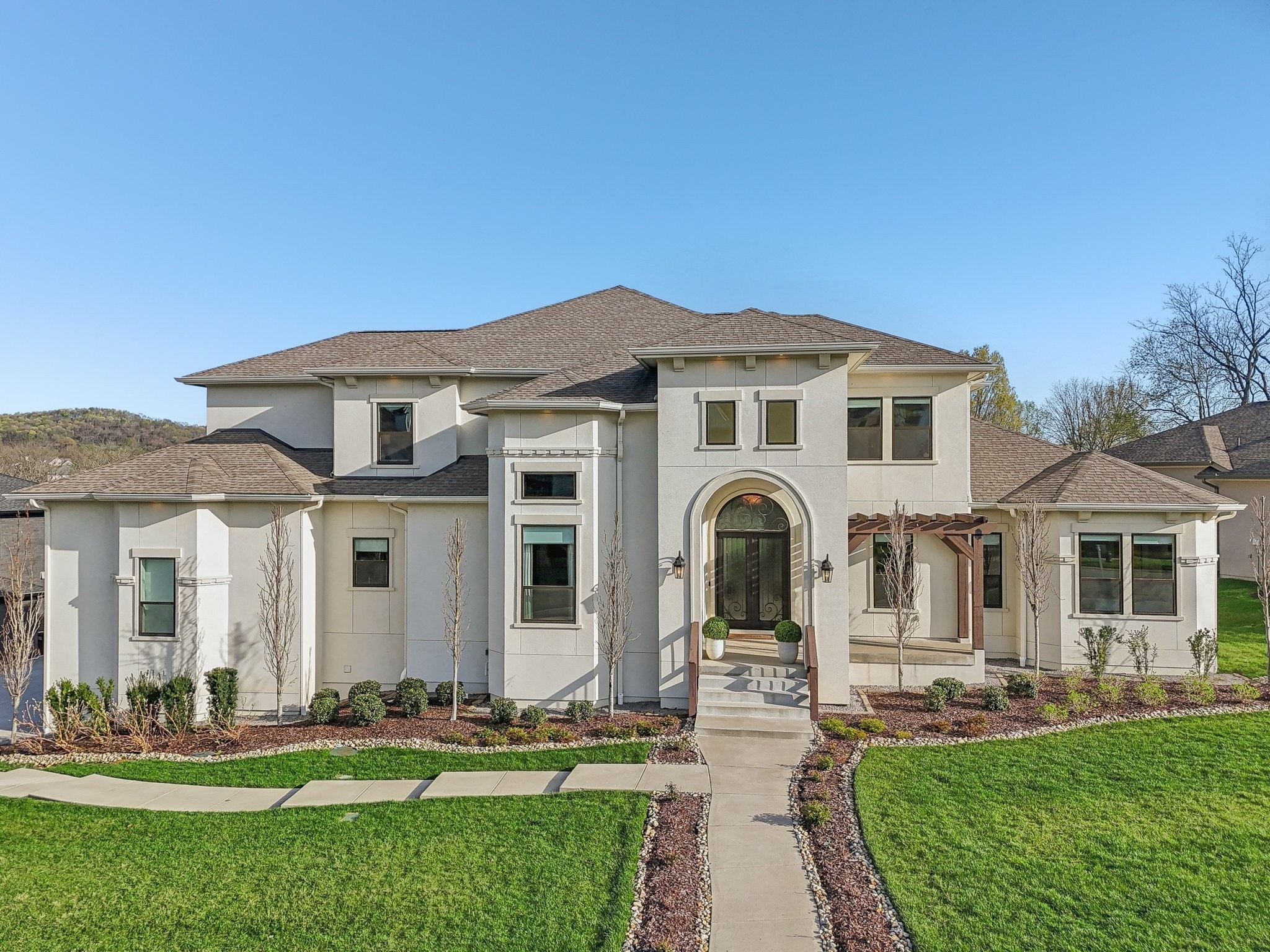 6004 Lookaway Circle Franklin, TN 37067 - Photo 1 of 80 a front view of a house with a yard