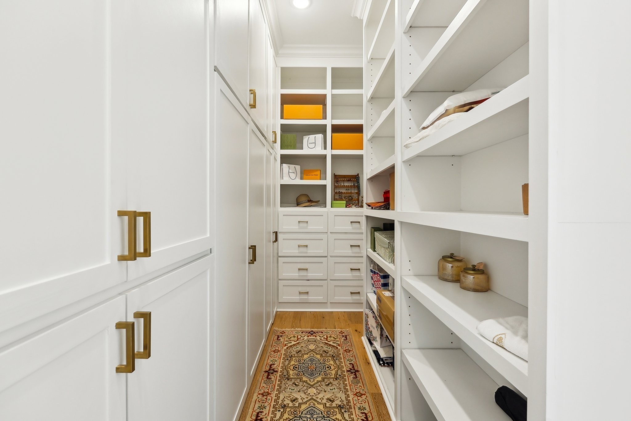 6004 Lookaway Circle Franklin, TN 37067 - Photo 47 of 80 a view of walk in closet with clothes and shoes