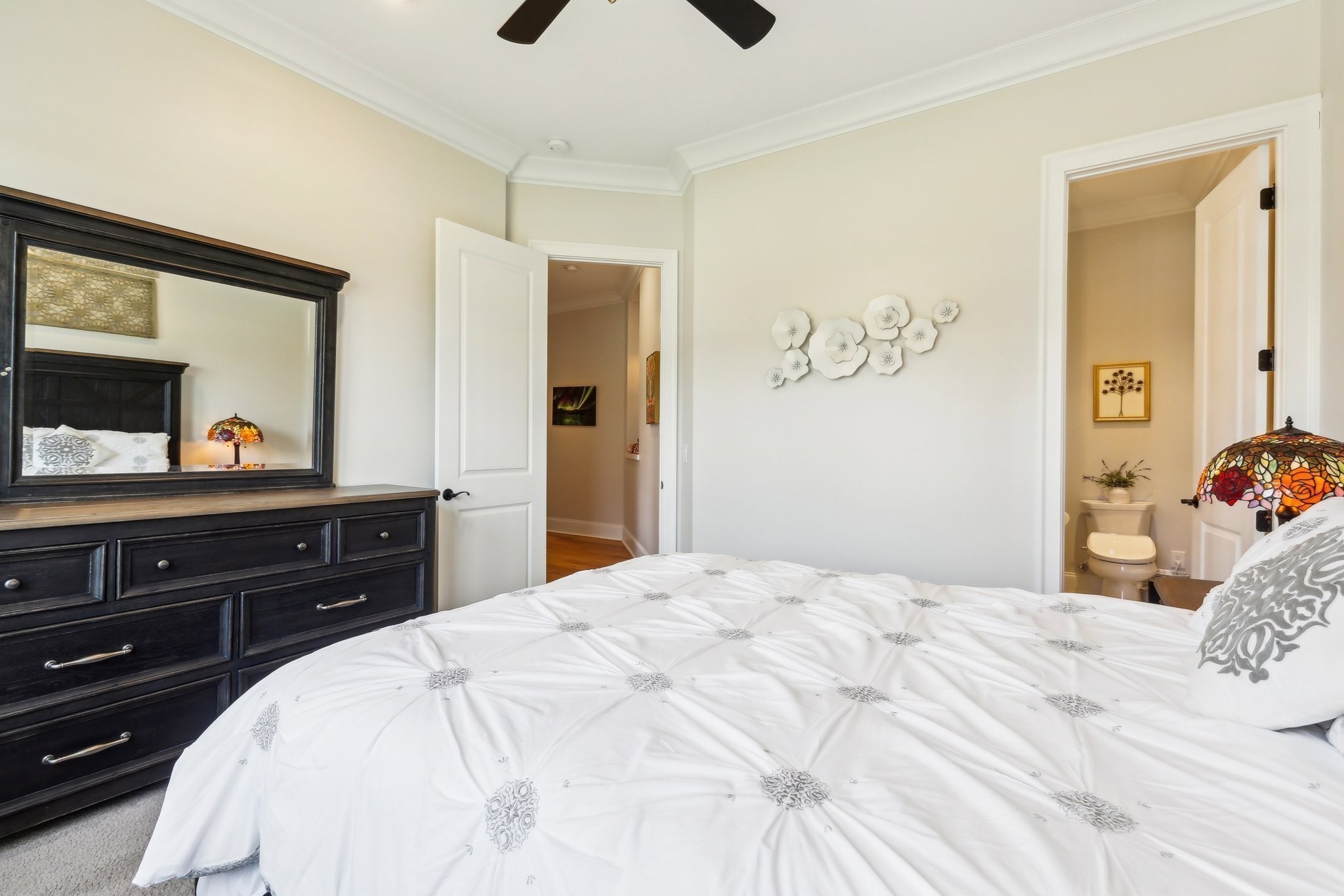 6004 Lookaway Circle Franklin, TN 37067 - Photo 57 of 80 a bedroom with a bed and a mirror on dresser