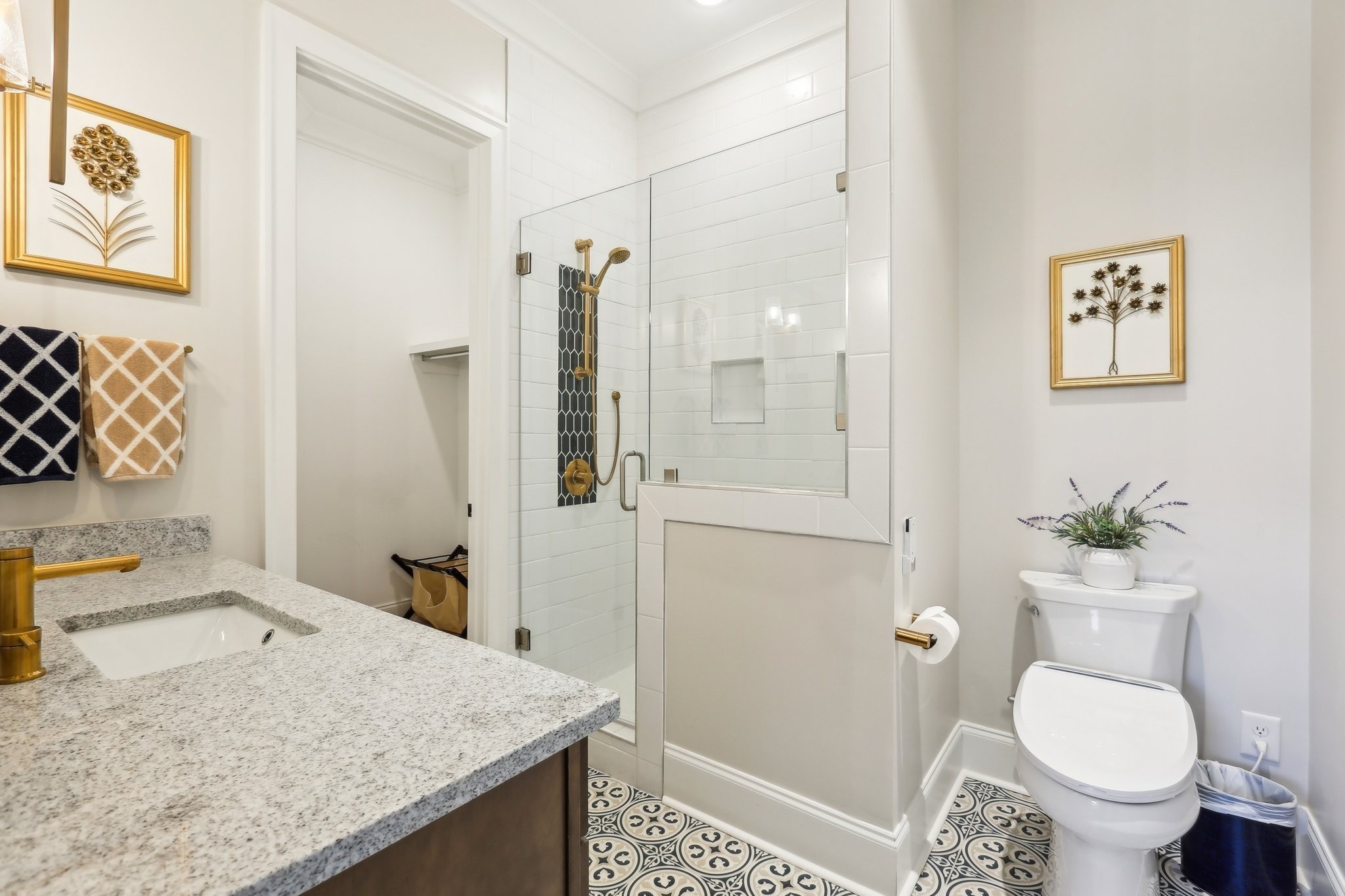 6004 Lookaway Circle Franklin, TN 37067 - Photo 59 of 80 a bathroom with a granite countertop sink toilet and shower