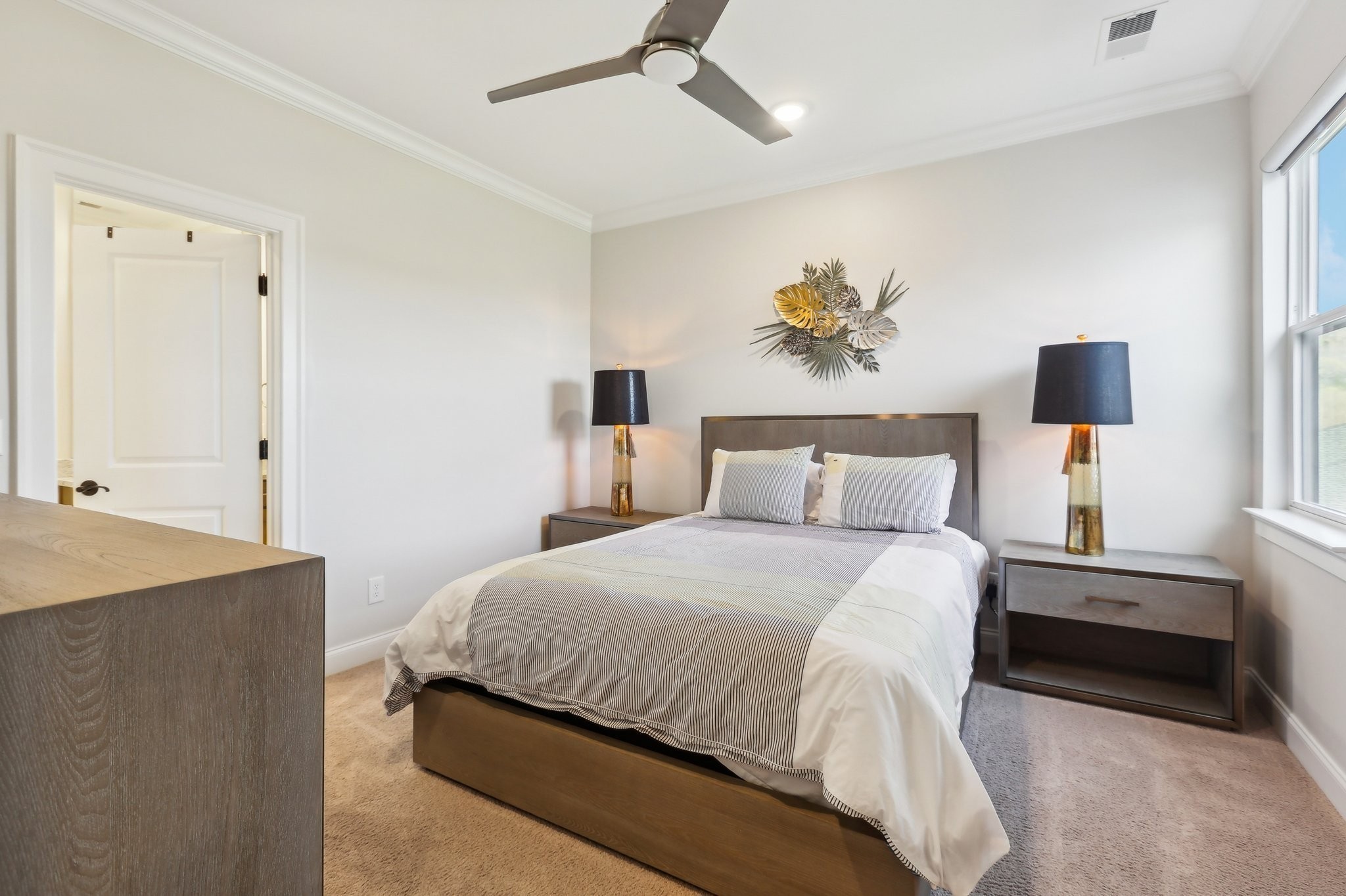 6004 Lookaway Circle Franklin, TN 37067 - Photo 62 of 80 a bedroom with a bed and a chandelier