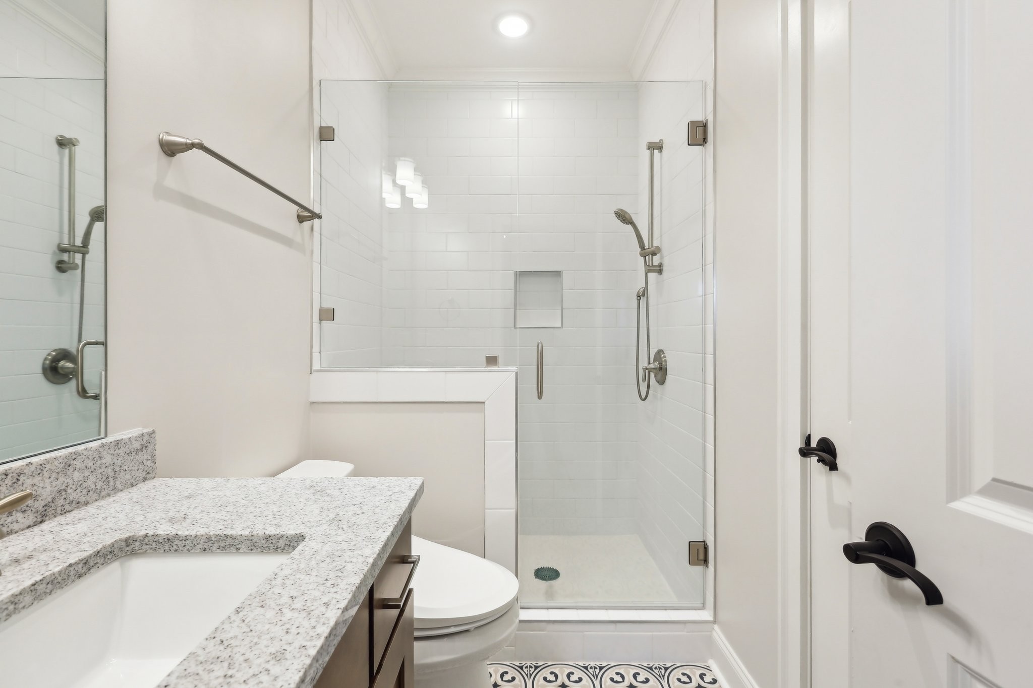6004 Lookaway Circle Franklin, TN 37067 - Photo 65 of 80 a bathroom with a granite countertop sink toilet and shower