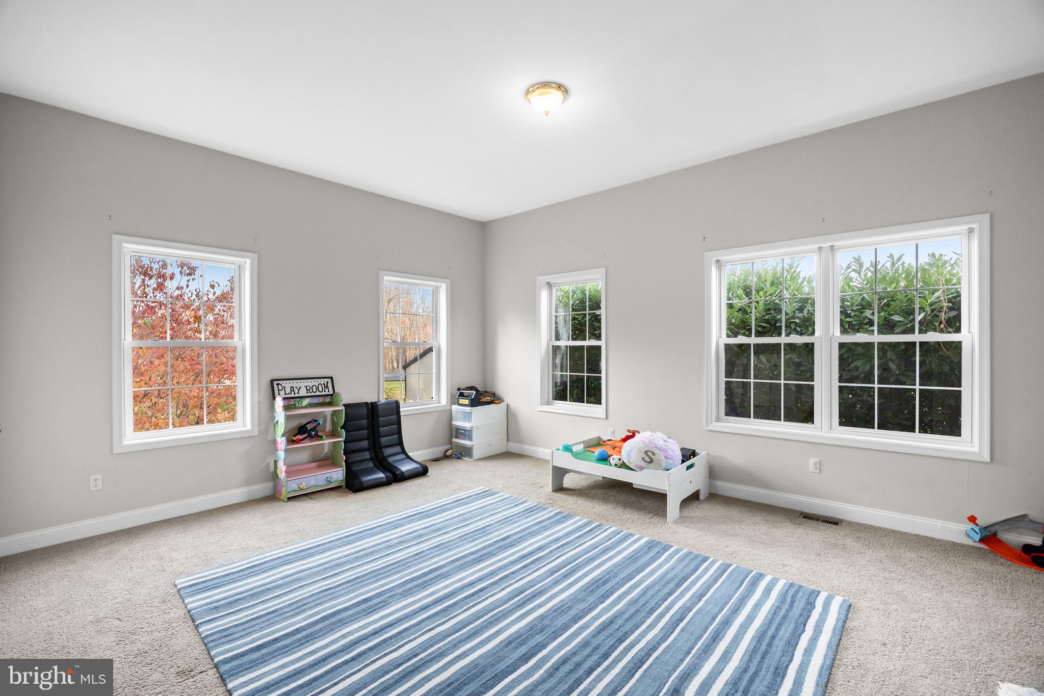 205 Sherwin Road Mullica Hill, NJ 08062 - Photo 27 of 70 a room with gym equipment and a window