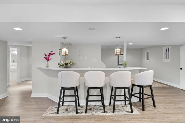 a view of a yard with large trees