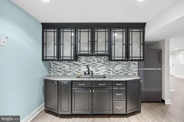 a picture of a bathroom with a shower