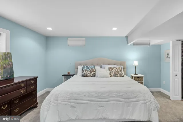 a picture of a bathroom with a shower