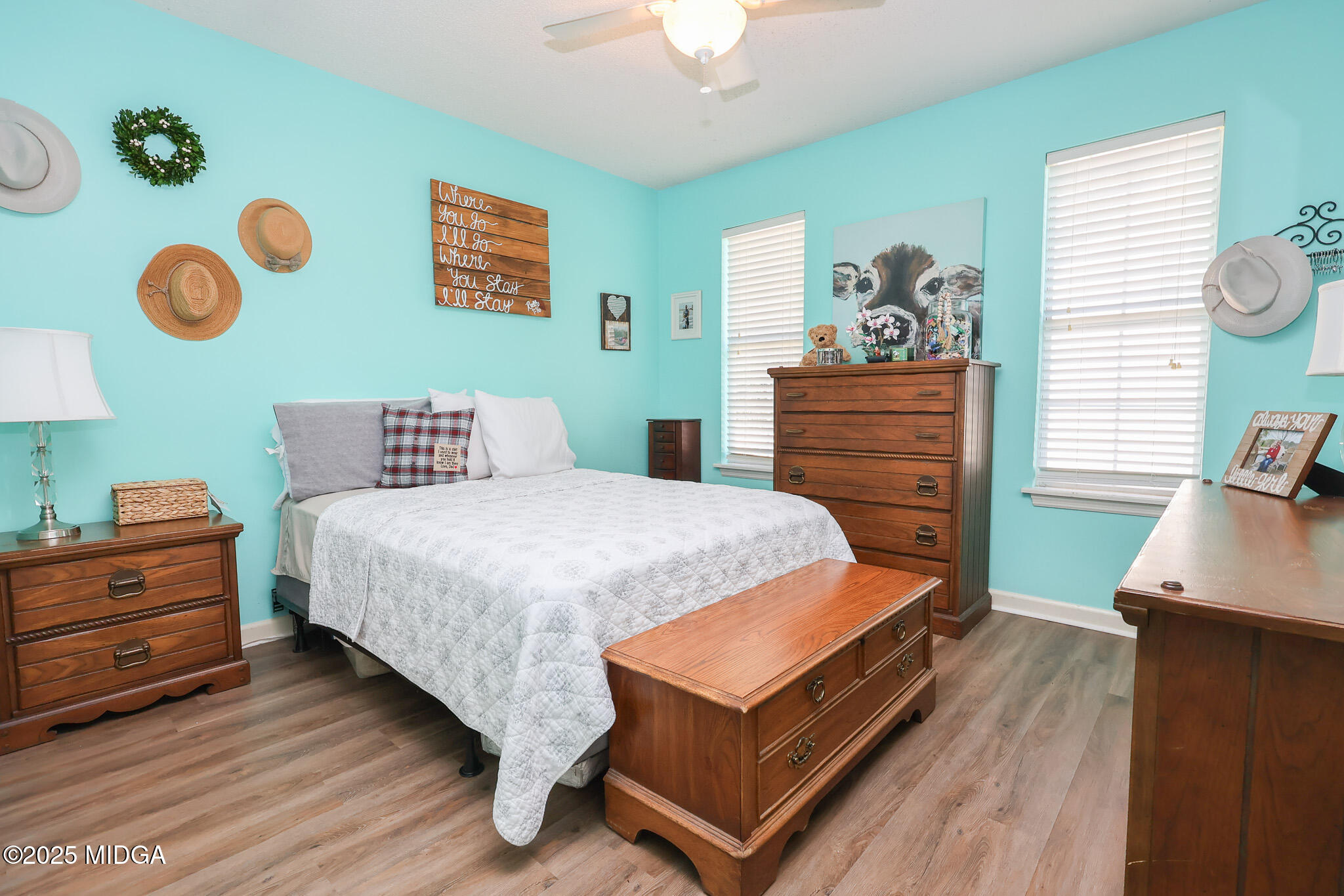 215 Stonefield Circle Macon, GA 31216 - Photo 14 of 26 a bedroom with a bed and a dresser in it
