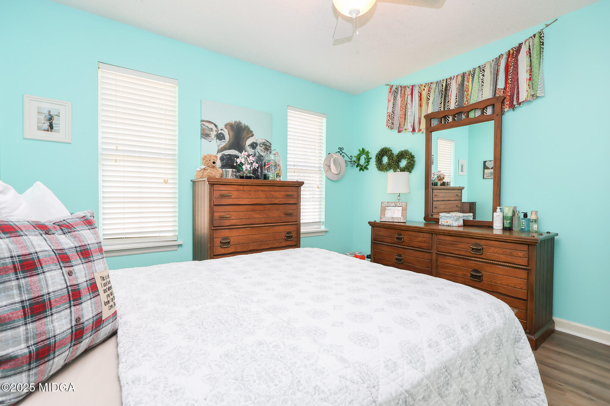 215 Stonefield Circle Macon, GA 31216 - Photo 15 of 26 a bedroom with a bed and a dresser in it