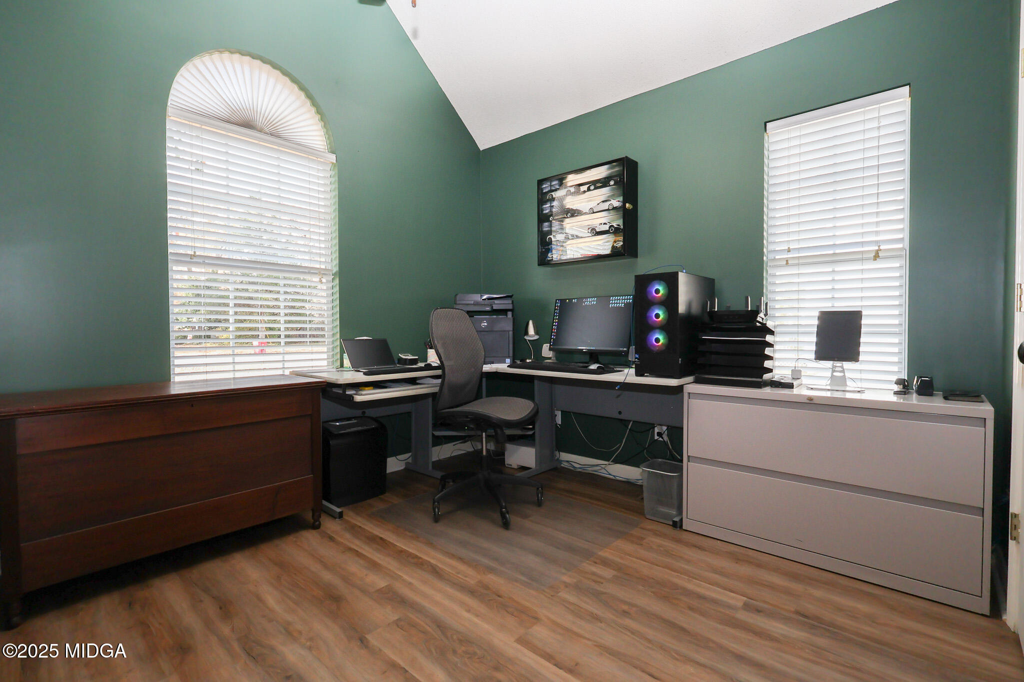 215 Stonefield Circle Macon, GA 31216 - Photo 17 of 26 a work room with furniture a rug and a window