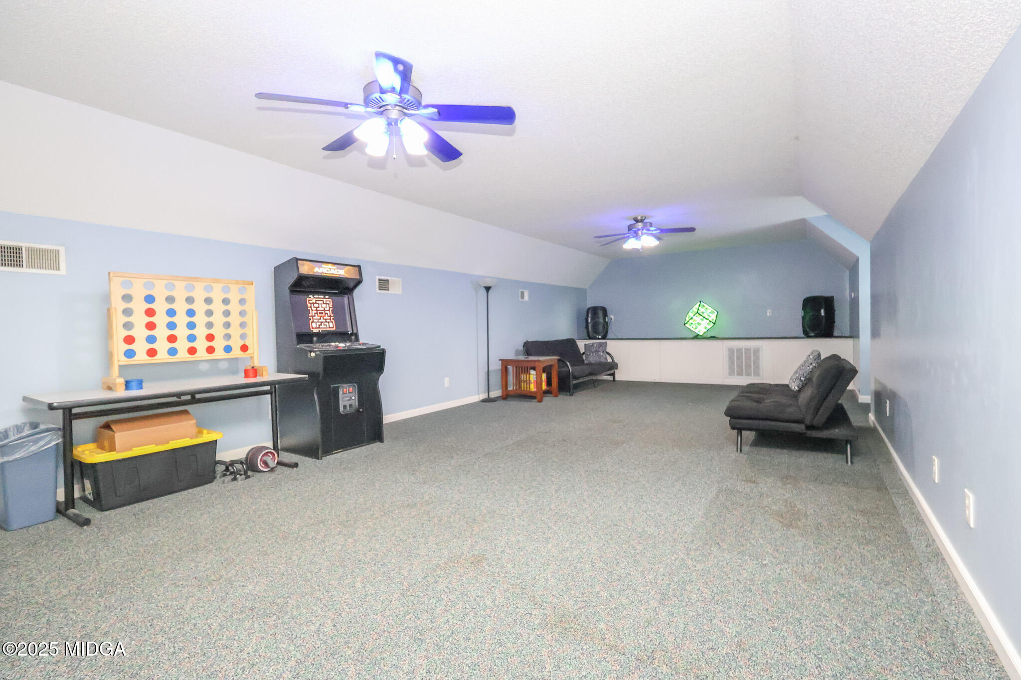 215 Stonefield Circle Macon, GA 31216 - Photo 24 of 26 a living room with furniture and a chandelier