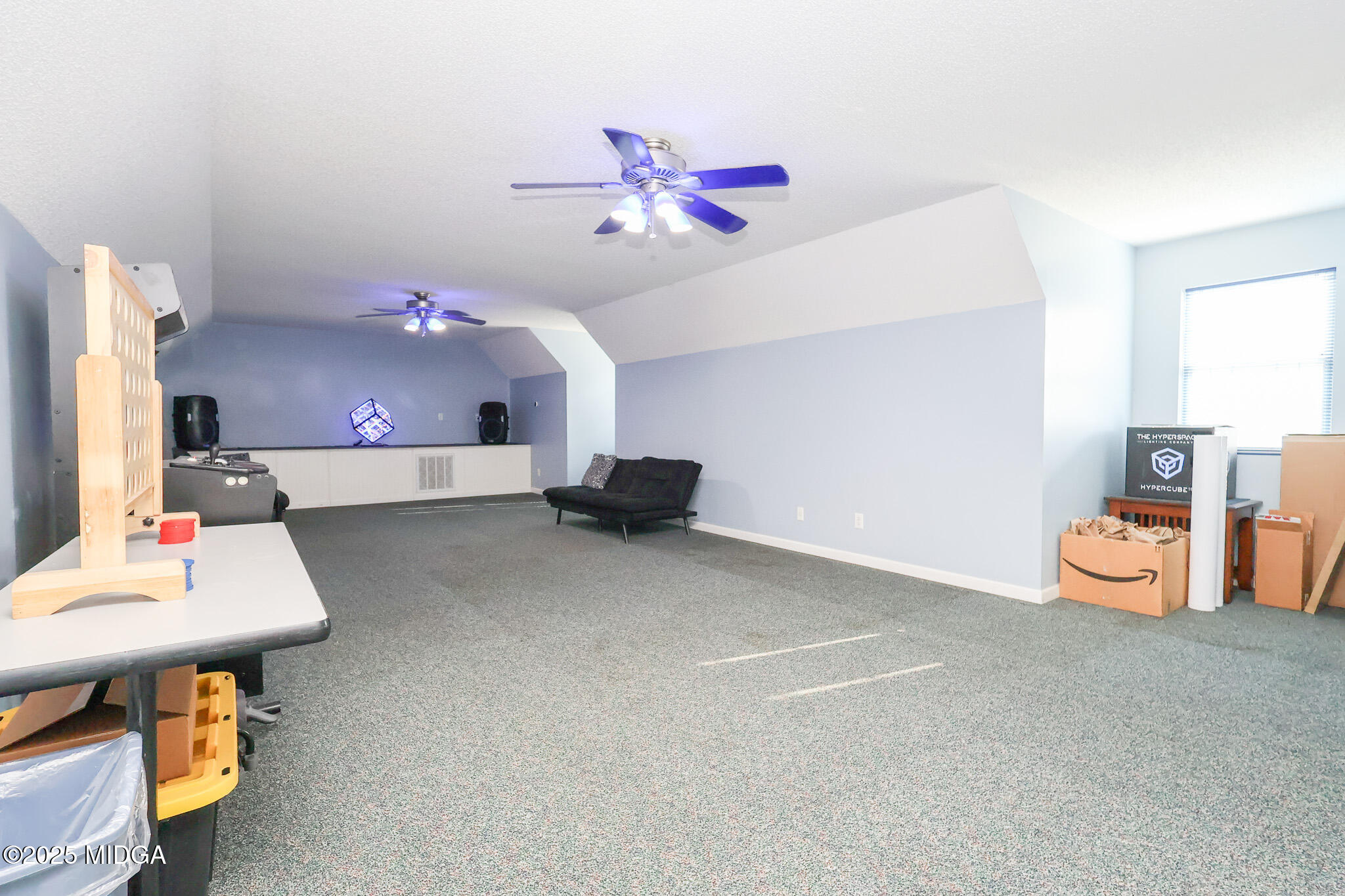 215 Stonefield Circle Macon, GA 31216 - Photo 25 of 26 a room with furniture and a couch