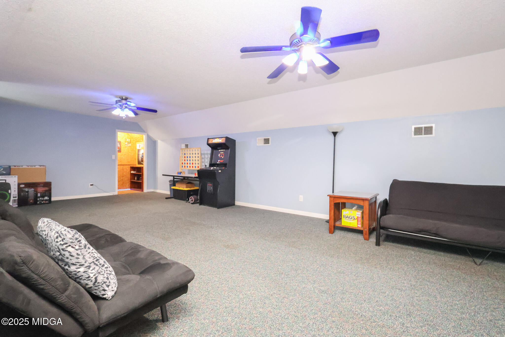 215 Stonefield Circle Macon, GA 31216 - Photo 26 of 26 a living room with furniture and a wooden floor