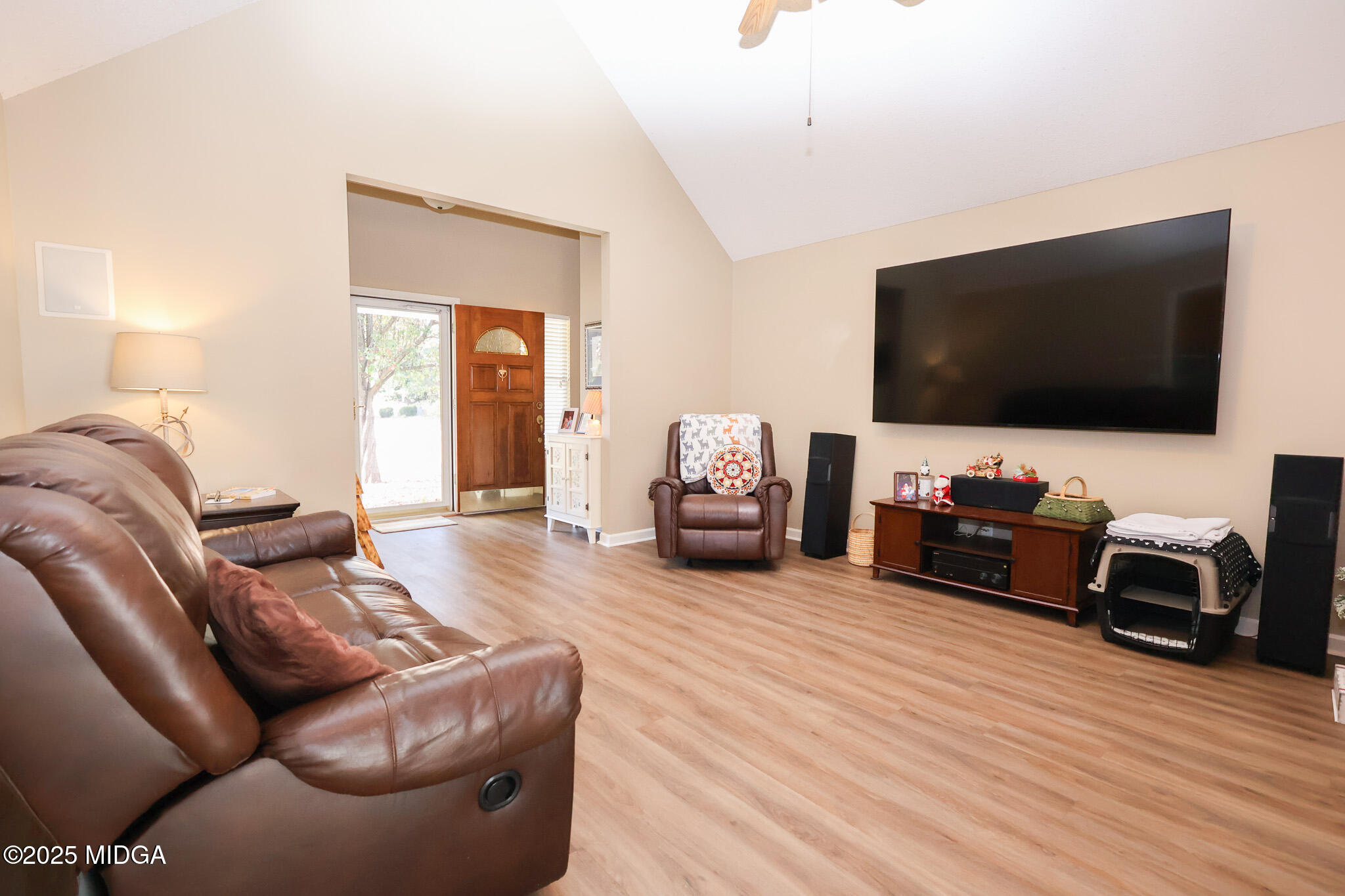 215 Stonefield Circle Macon, GA 31216 - Photo 6 of 26 a living room with furniture and a flat screen tv
