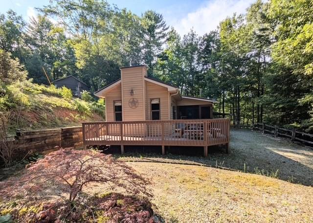 116 Minerva Lane Sapphire, NC 28774 - Photo 1 of 42 a view of a house with a yard