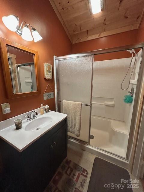 116 Minerva Lane Sapphire, NC 28774 - Photo 14 of 42 a bathroom with a sink mirror and shower