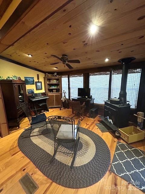 116 Minerva Lane Sapphire, NC 28774 - Photo 25 of 42 a living room with patio furniture and a wooden floor