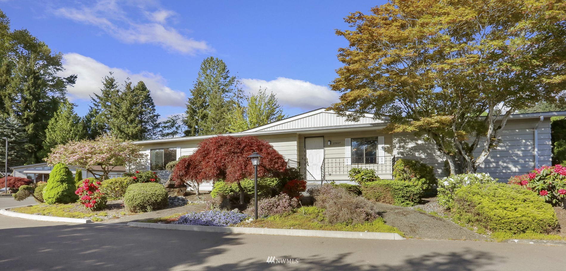 23627 Lake Drive East Bothell, WA 98021 - Photo 1 of 40 a front view of a house with a yard