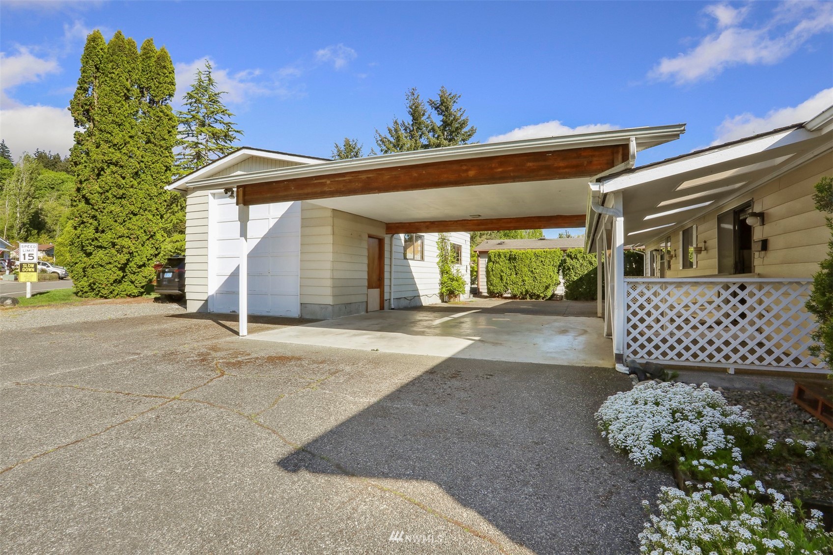 23627 Lake Drive East Bothell, WA 98021 - Photo 25 of 40 a front view of a house with a outdoor space