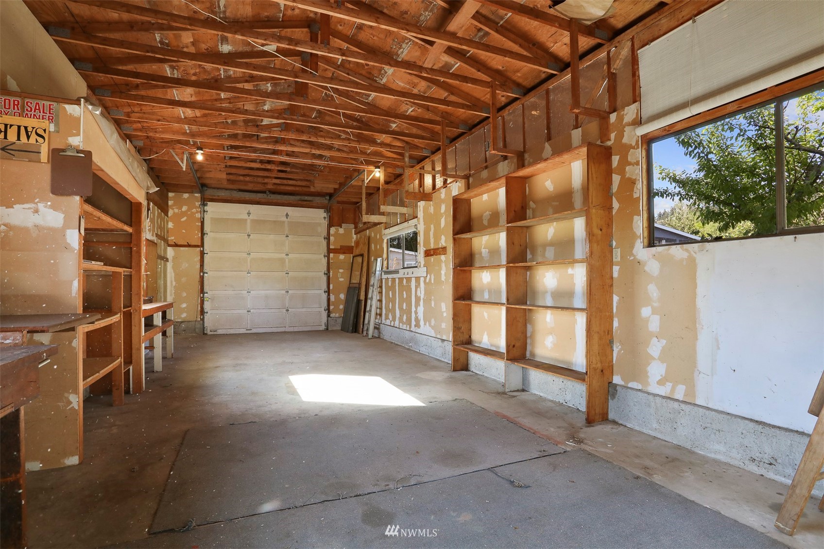 23627 Lake Drive East Bothell, WA 98021 - Photo 31 of 40 a view of an empty room with a garage