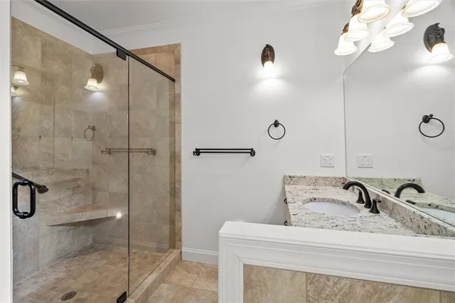 a view of a livingroom with workspace and a window