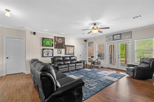 a view of a lake with houses in the background