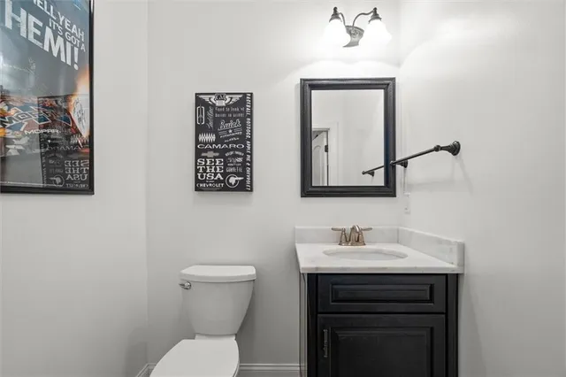 an aerial view of a house with a lake view