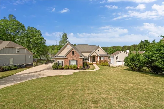 front view of a house with a yard