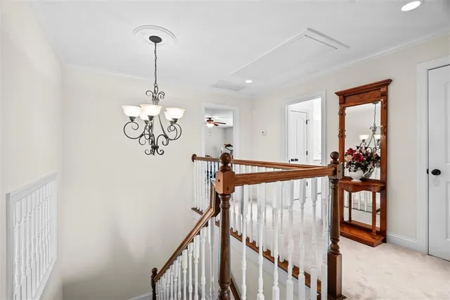 an aerial view of a house with a yard lake lake and mountain view