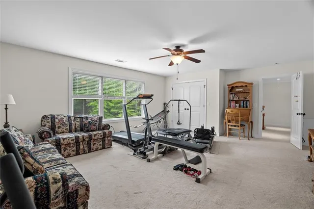 a view of a lake with houses in the back