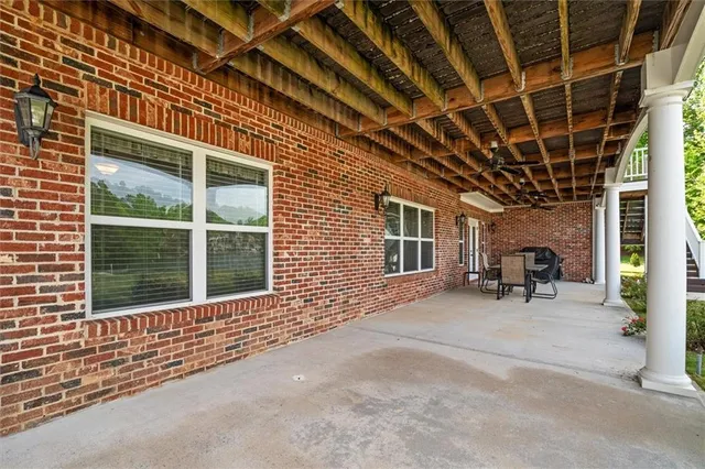 a view of lake with green space