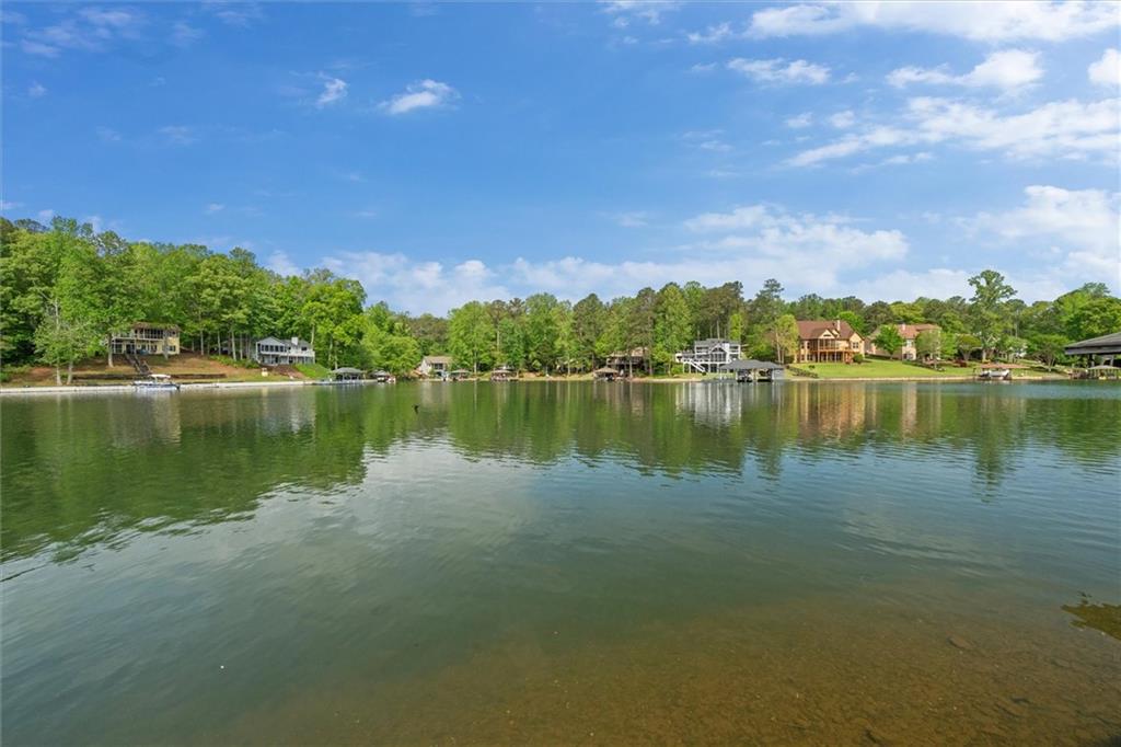 2191 Lakeview Parkway Villa Rica, GA 30180 - Photo 59 of 96 a view of a lake with houses in the background