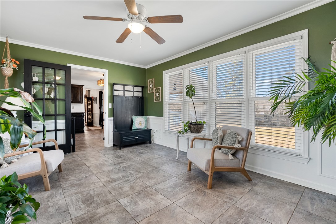 112 C-10-220 Anderson, SC 29621 - Photo 23 of 45 Bright sunroom with ample natural light, creating an inviting and airy atmosphere.
