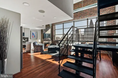 a view of entryway with wooden floor