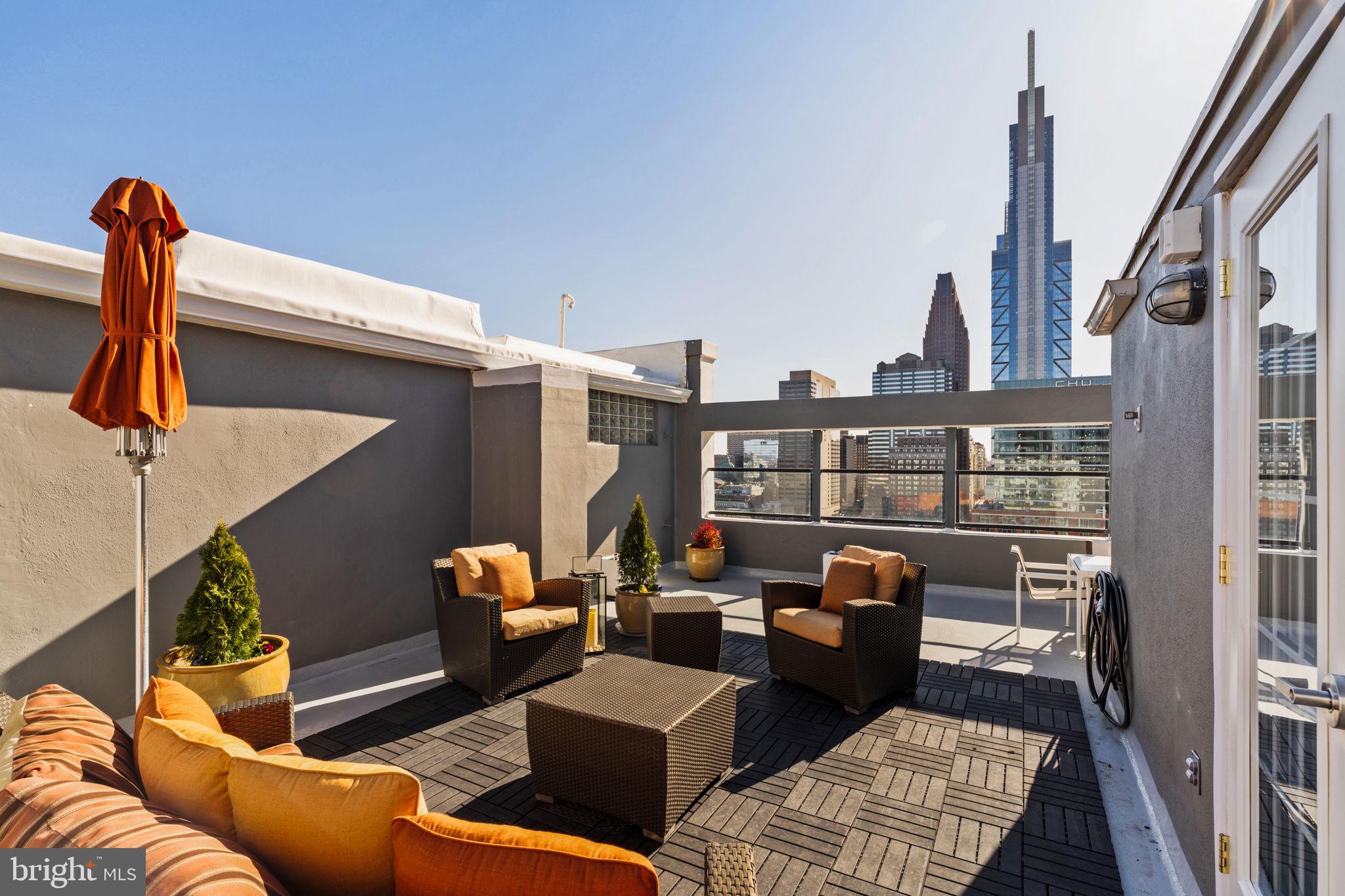 2200-28 Arch Street, Unit 1205 Philadelphia, PA 19103 - Photo 26 of 48 a outdoor living space with furniture