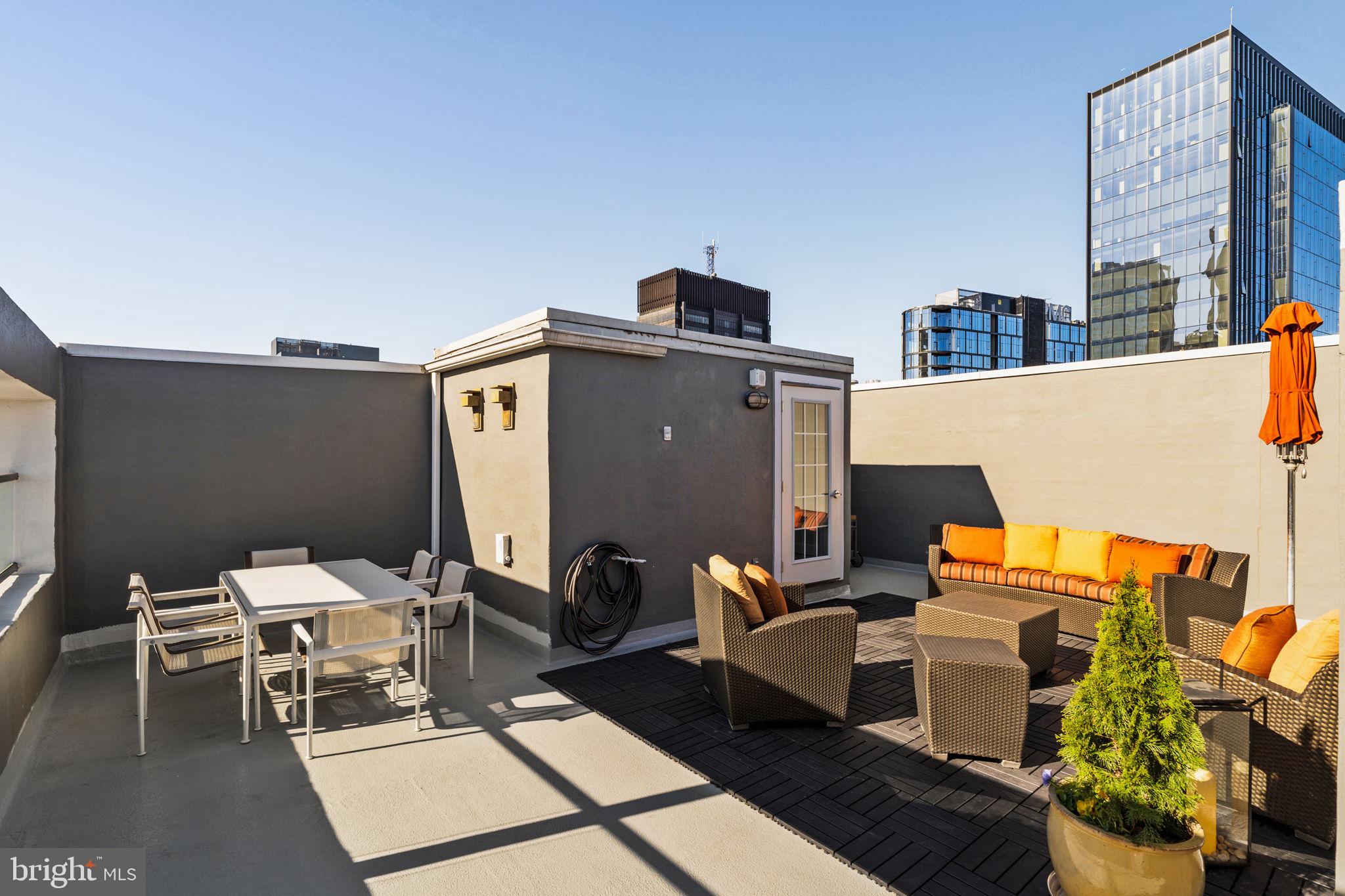 2200-28 Arch Street, Unit 1205 Philadelphia, PA 19103 - Photo 28 of 48 a terrace of a house with outdoor seating