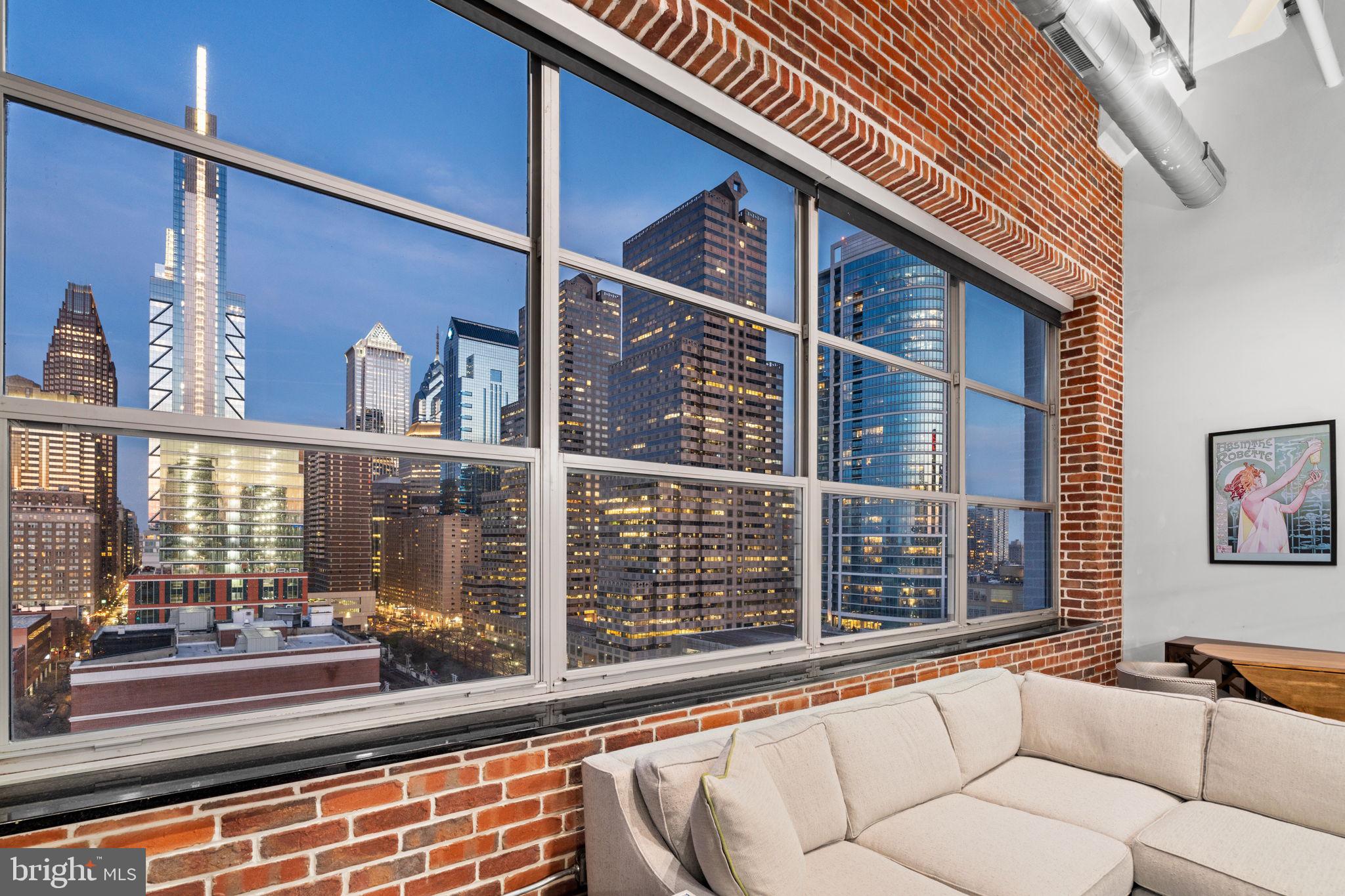 2200-28 Arch Street, Unit 1205 Philadelphia, PA 19103 - Photo 32 of 48 a view of a balcony with furniture