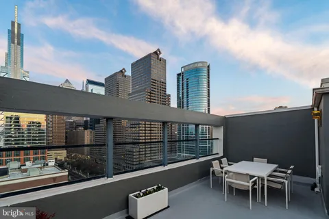 a backyard of a house with seating space