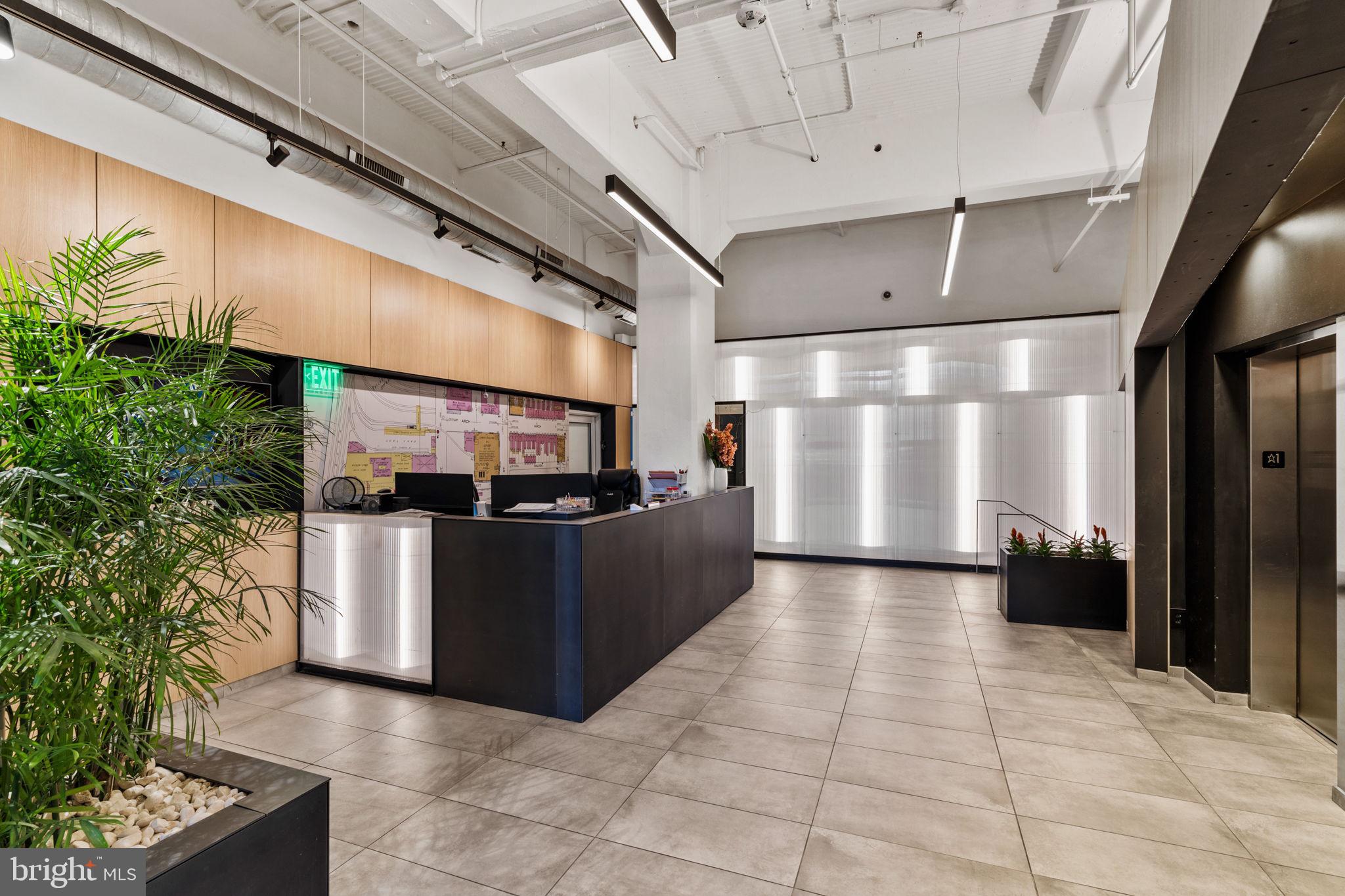 2200-28 Arch Street, Unit 1205 Philadelphia, PA 19103 - Photo 45 of 48 a view of a building with a potted plant