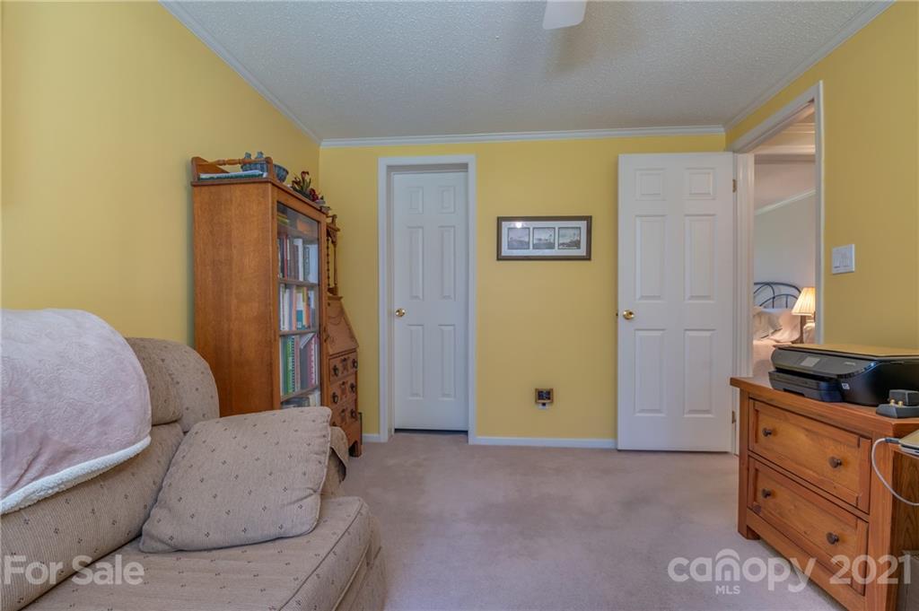 569 Flynn Road Rutherfordton, NC 28139 - Photo 27 of 34 a bedroom with a bed and furniture