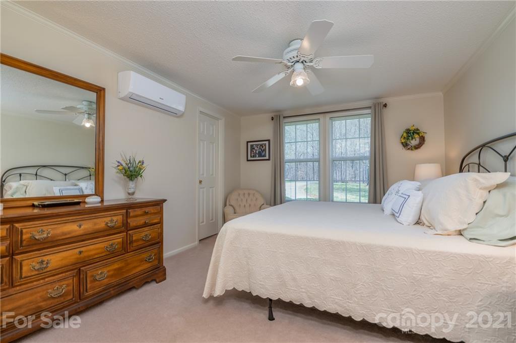 569 Flynn Road Rutherfordton, NC 28139 - Photo 28 of 34 a bedroom with a bed and window