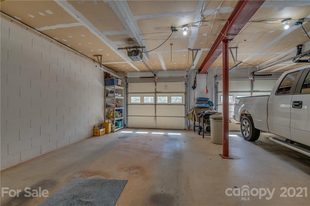 569 Flynn Road Rutherfordton, NC 28139 - Photo 32 of 34 a view of a garage with wooden roof