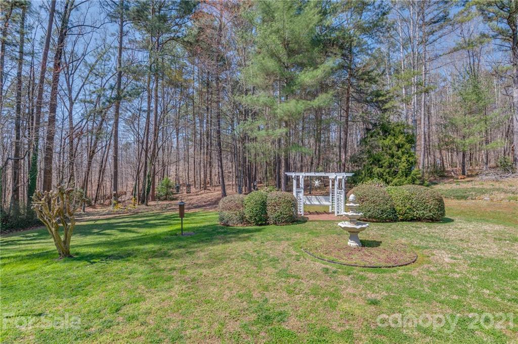 569 Flynn Road Rutherfordton, NC 28139 - Photo 6 of 34 a view of a house with backyard and sitting area