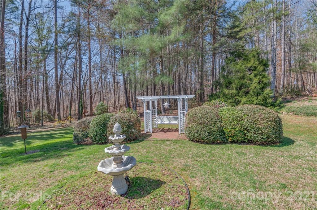 569 Flynn Road Rutherfordton, NC 28139 - Photo 9 of 34 a house view with a garden space