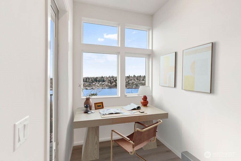 2921 Franklin Avenue East, Unit B Seattle, WA 98102 - Photo 12 of 30 a dining room with a table and chairs