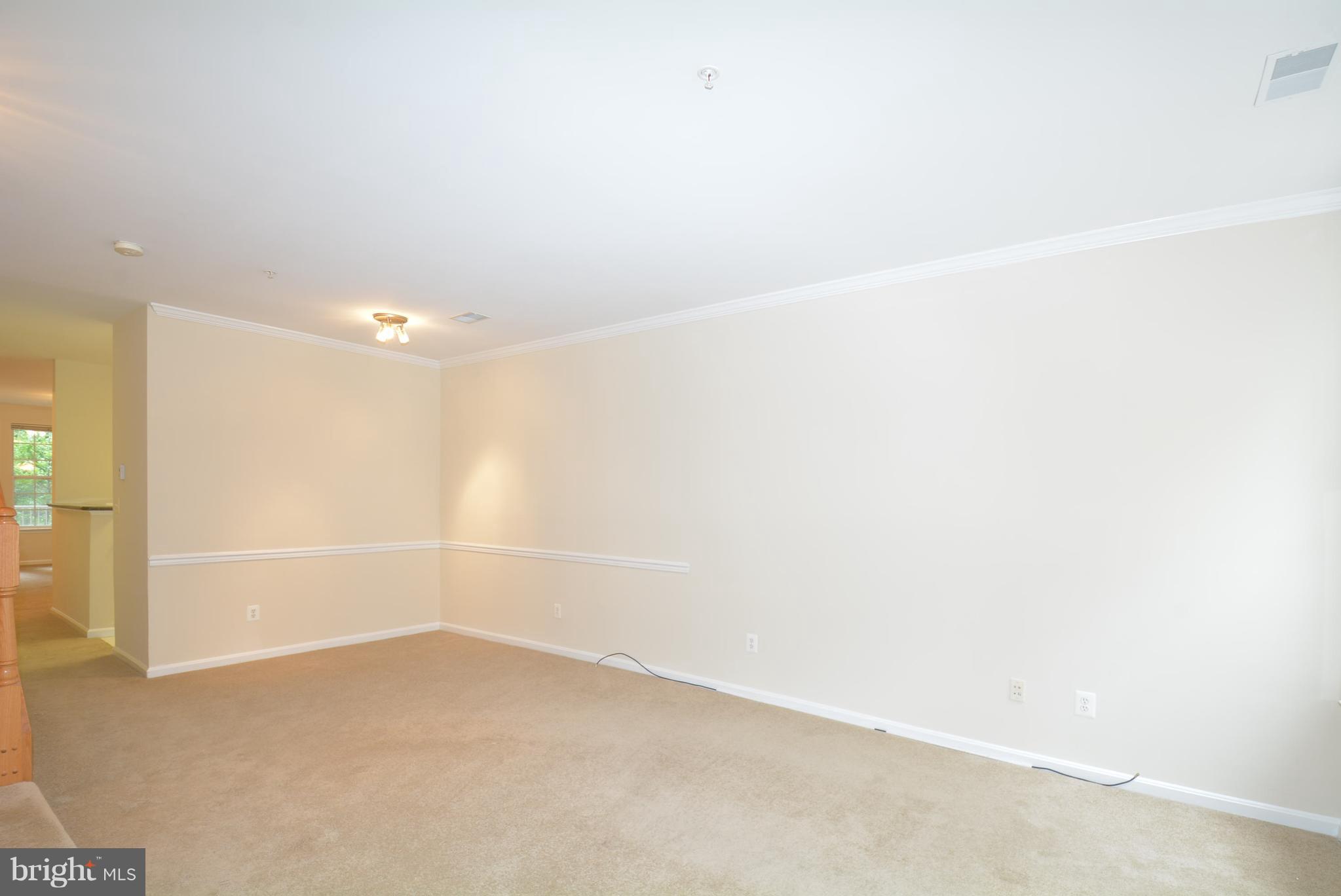 2665 Manhattan Place, Unit 101 Vienna, VA 22180 - Photo 2 of 23 a view of an empty room