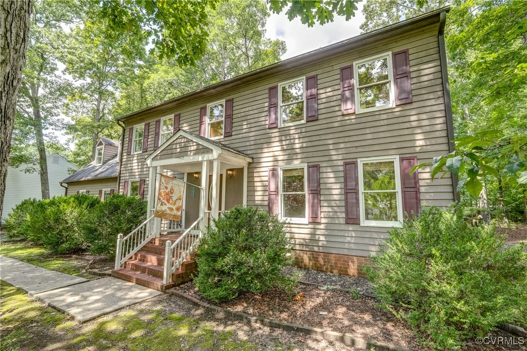 2330 Corner Rock Road Midlothian, VA 23113 - Photo 1 of 1 a front view of a house with garden