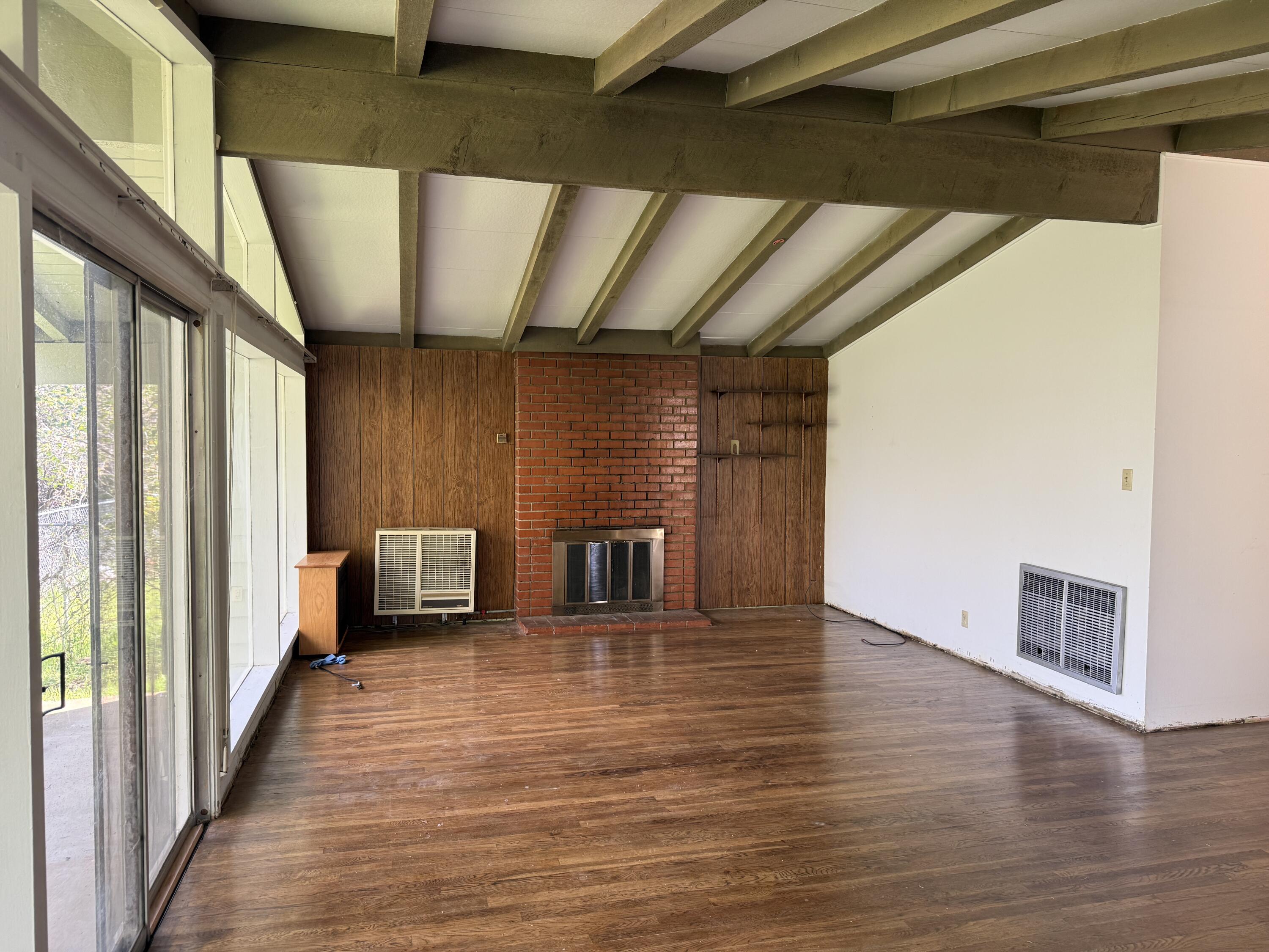1400 Riviera Drive Redding, CA 96001 - Photo 5 of 15 a view of a hallway with wooden floor