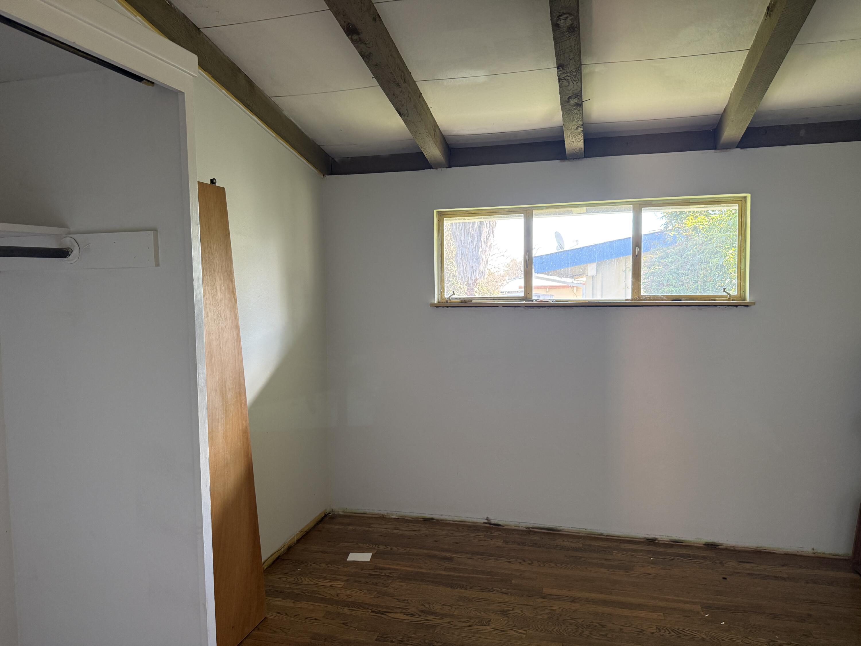 1400 Riviera Drive Redding, CA 96001 - Photo 7 of 15 a view of empty room with wooden floor